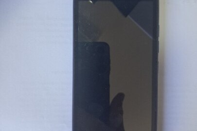 Конфісковане майно: мобільний телефон марки" TECNO", IMEI1: 355328115115822, IMEI2: 355328115115830, з абонентським номером Водафон, стан б/в