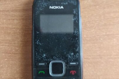 Мобільний телефон чорного кольору NOKIA, модель: 1661-2, без зарядного пристрою, б/у