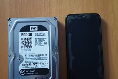  Конфіскація майна за рішенням суду: мобільний телефон марки  «Redmi Note 8 Pro» та  ЖМД,  500 Gb. WD Black Desktop Hard Drive -  2шт, б/в