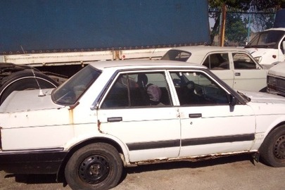 Легковий автомобіль Honda Accord, державний номер 50570НА, 1987 року випуску, білого кольору, кузов №AD1016093, двигун № ЕК1004412
