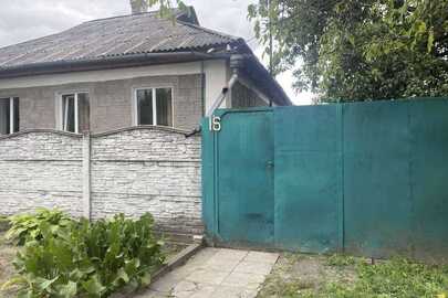 Житловий будинок з господарськими будівлями загальною площею 92,1 кв.м., що знаходиться за адресою: Полтавська область, м. Кременчук, вулиця Кагамлицька, будинок 16