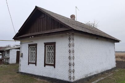 Житловий будинок з господарськими будівлями загальною площею 44.8 кв.м., за адресою: Полтавська обл., Кременчуцький р.(колишній Кобеляцький р.), с. Комендантівка, вул. Набережна, буд. 54