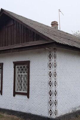 Житловий будинок з господарськими будівлями загальною площею 44.8 кв.м., за адресою: Полтавська обл., Кременчуцький р.(колишній Кобеляцький р.), с. Комендантівка, вул. Набережна, буд. 54