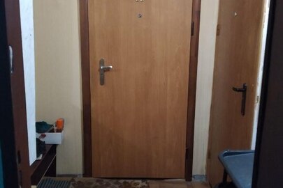 1/5 та 1/15 частини двокімнатної квартири загальною площею 50.3 кв.м., розташована за адресою: Полтавська область, м. Кременчук, вул. Велика Набережна, буд. 29, кв. 57