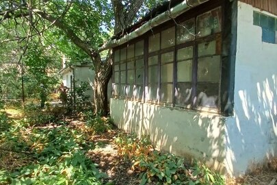1/4 частина домоволодіння, загальною житловою площею - 81,8 м.кв., за адресою: м. Одеса, вул. Педагогічна, 13