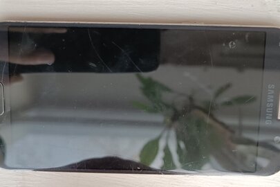 Конфіскація майна за виконавчим листом: мобільний телефон марки "Samsung" чорного кольору, б/в