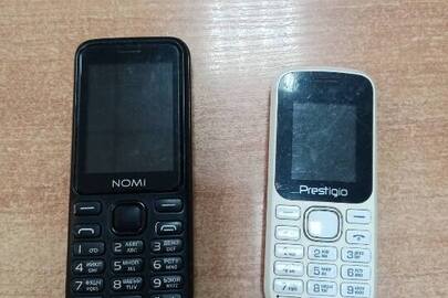 Конфіскація майна за виконавчим листом: два мобільних телефони марки "Prestigio" білого кольору та марки "NOMI" чорного кольору у неробочому стані, б/в