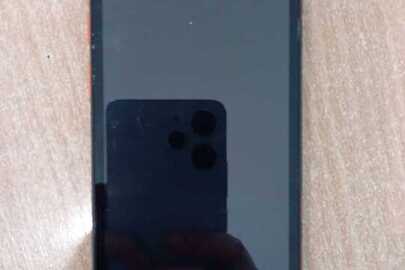Конфісковане майно за  рішенням суду: мобільний телефон марки "Redmi", б/в, 1 шт.