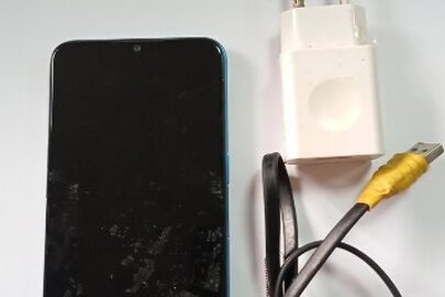 Конфіскація майна за рішенням суду: мобільний телефон марки "REALME" ІМЕІ: відсутній та зарядний пристрій, б/в