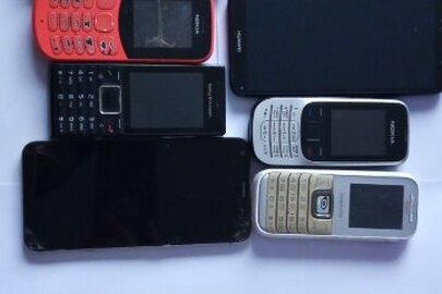 Конфіскація майна за рішенням суду: мобільні телефони 8 шт., б/в