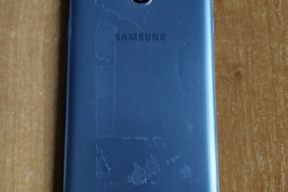 Конфіскація майна за рішенням суду: мобільний телефон, марки "Samsung" сірого кольору, модель SM-J1400, imei1:358410091884238, imei2:358411091884236 б/в