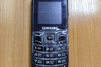 Конфіскація майна за рішенням суду: мобільний телефон, марки "Samsung" GТ-Е1200 imei: 356561064340020, б/в