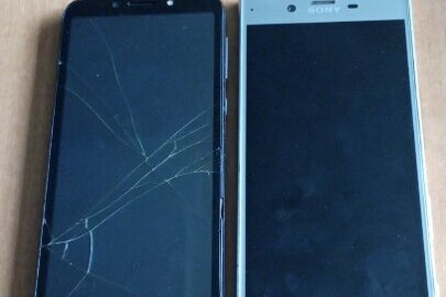 Конфіскація майна за рішенням суду: два мобільні телефони: «Motorola», «Sony Experia», б/в