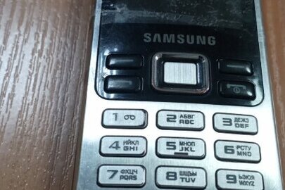 Конфіскація майна за рішенням суду: мобільний телефон "Samsung", Б/В