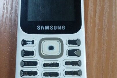 Конфіскація майна за рішенням суду: мобільний телефон "Samsung", Б/В