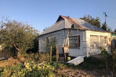 Житловий будинок загальною площею 64,5 кв.м., господарські будівлі та споруди, що розташовані за адресою: Київська область, Білоцерківський район, с. Коженики, вулиця Новосельська, буд. 12