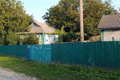 Житловий будинок, загальною площею 43,2 кв.м. та земельна ділянка, загальною площею 0,25 га, кад. номер 0521083400:02:002:0100, що знаходяться за адресою: Вінницька область, Жмеринський р., с. Новоселиця, вул. Затишна, 21