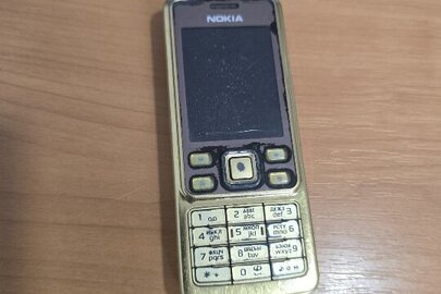 Конфісковане майно за рішенням суду: мобільний телефон «NOKIA» модель невідомо, ІМЕІ – невідомо, золотистого кольору бувший у використанні,технічний стан та можливість використання за призначенням невідомі