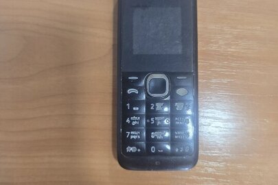 Конфісковане майно за рішенням суду: мобільний телефон «NOKIA» модель 105, ІМЕІ – 357134/06/822504/04, чорного кольору бувший у використанні ,технічний стан та можливість використання за призначенням невідомі