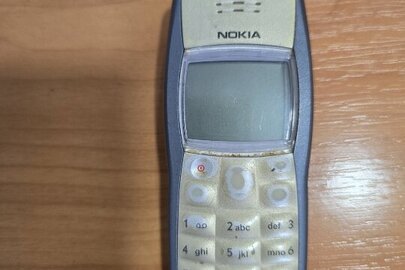 Конфісковане майно за рішенням суду: мобільний телефон «NOKIA» модель 1101, ІМЕІ – 35880300/855696/6, сірого кольору бувший у використанні ,технічний стан та можливість використання за призначенням невідомі