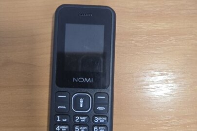 Конфісковане майно за рішенням суду: мобільний телефон «NOMI» модель i1880, чорного кольору, бувший у використанні, технічний стан - невідомий