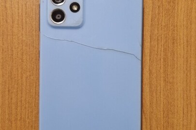 Конфісковане майно за рішенням суду: мобільний телефон марки "SAMSUNG", б/в, модель SM-G350E, imei:355042100150343014 та акумуляторна батарея марки "SAMSUNG", б/в