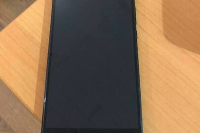 Конфісковане майно за рішенням суду мобільний телефон XIAOMI MDE40 у корпусі темного кольору, стан роботи невідомий; б/в