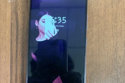 Конфіскація майна за рішенням суду:мобільний телефон марки SAMSUNG моделі SM-A325F IDS б\в ,фіолетового кольору, у якому міститься сім-карта оператора мобільного зв'язку 