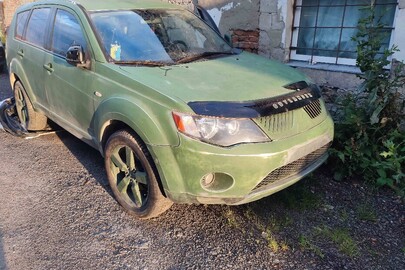 Колісний транспортний засіб, загальний легковий універсал-В, марки MITSUBISHI модель OUTLANDER, рік випуску - 2008, реєстраційний номер АХ1187ІХ, VIN JMBXTCW5W8Z009378, сірого кольору (на момент огляду перефарбована у зелений)