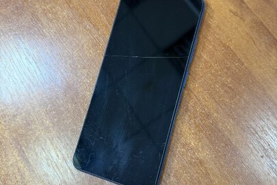 Конфісковане майно: мобільний телефон "Xiaomi Redmi", б/в