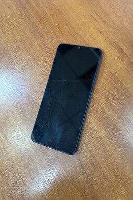 Конфісковане майно: мобільний телефон "Xiaomi Redmi", б/в