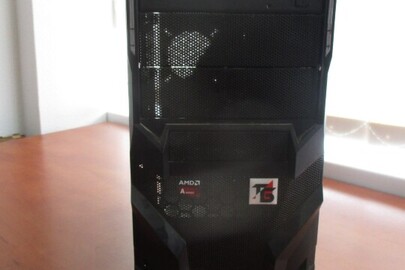Системний блок комп'ютера в корпусі чорного кольору торгової марки AMDA