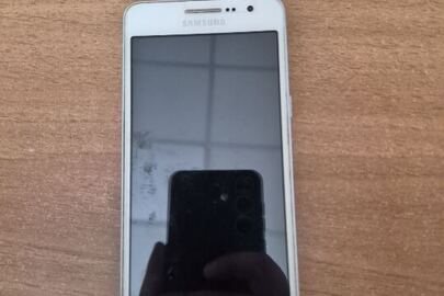 Конфіскація майна за рішенням суду: мобільний телефон «SAMSUNG GM-G530FQ» IMEI №357210062577212, бувший у використанні