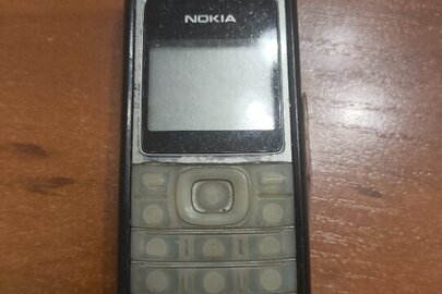 Конфіскація майна за рішенням суду: мобільний телефон марки "Nokia", імеі 1 - не встановлено, чорного кольору, б/в