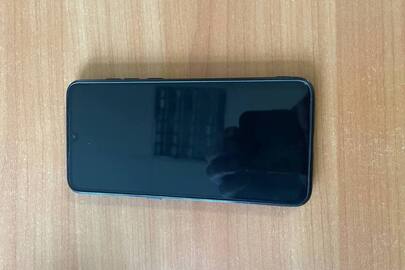 Мобільний телефон "Xiaomi" моделі "Мі 9", б/в