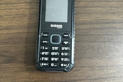 Конфісковане майно: обільний телефон марки `SIGMA` моделі Х-style чорного кольору ІМЕІ №1: 354386335368812, ІМЕІ №2: 354386335368820,б/в