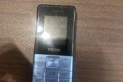 Конфісковане майно: марки " TECNO T-301" в корпусі сріблясто-голубого кольору, IMEI № 1: 359873386740887; № 2: 35987336740898, б/в