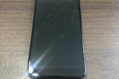 Конфісковане майно: мобільний телефон марки "SAMSUNG" моделі Galaxy A6 в корпусі чорного кольору, IMEI № 1: 358952/09/421050/7, № 2: 358952/09421050/5, б/в