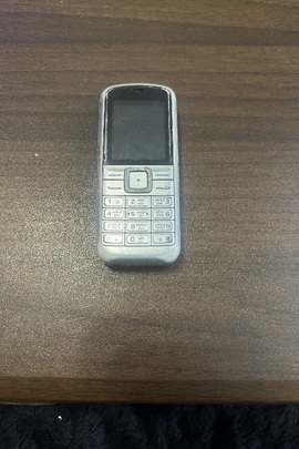 Конфісковане майно:мобільний телефон марки ''NOKIA'' моделі 6070 в корпусі cірого кольору, IMEI №354548/01/23201/1, б/в