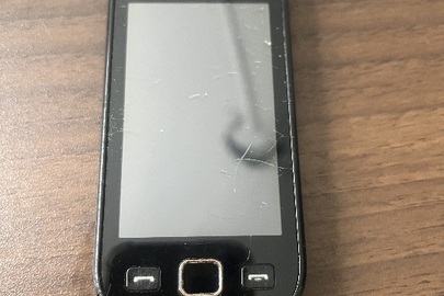 Конфісковане майно за постановою: мобільний телефон марки "SAMSUNG" модель GT-S5250 в корпусі чорного кольору, б/в
