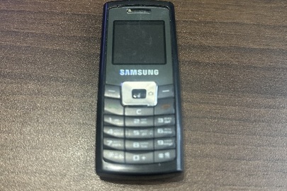 Конфісковане майно за рішенням суду: мобільний телефон марки "SAMSUNG" модель "SGH-C450" в корпусі чорного кольору, б/в