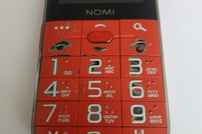 Конфісковане майно: мобільний телефон марки"NOMI" моделі i220 в корпусі червоного кольору, IMEI № 1: 359040100354375; № 2: 3590401100354383, б/в