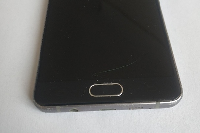 Конфісковане майно: мобільний телефон марки "SAMSUNG " моделі " SM-A 510F" в корпусі чорного кольору, IMEI № 1: 352937/08/866249/6, б/в