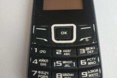 Конфісковане майно: мобільний телефон марки «NOMI»моделі «і144»в корпусі чорного кольору, Іmei стертий, б/в