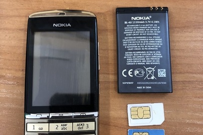 Мобільний телефон марки "Nokia" та акумулятор до нього; SIM-картки операторів сотового зв'язку "djuice" (№ 8938003992087257976F), "Lyca mobile" (№ 8948090010020300606), "Київстар" (№ 8938003992068915212F)