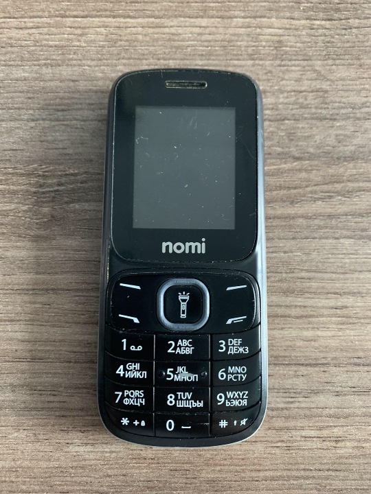 Мобільний телефон марки «Nomi I 183» (ІМЕІ 1: 353493061426912), (ІМЕІ 2: 353493061426920), з акумуляторною батареєю «fly BL 4255»
