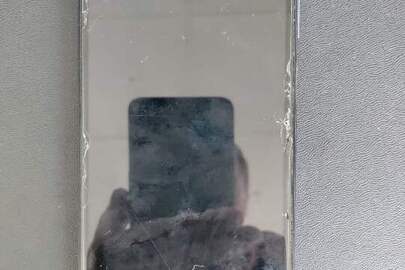 Мобільний телефон синього кольору в чохлі чорного кольору марки «Redmi» ІМЕІ 1 - 861722051690037/00, ІМЕІ 2 - 861722051690045/00, ICCID2 - 8938006230056582049, серійний номер - fafc6744, бувший у використанні