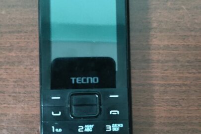 Мобільний телефон марки «TECNO T372», ІМЕІ: 351271750884373, ІМЕІ: 351271750884381, ІМЕІ: 351271750884399, серійний номер К6Т13, із зарядним пристроєм, бувший у використанні