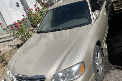 Легковий автомобіль MAZDA XEDOS 9, ДНЗ 18352НР, 2002р.в., жовтого кольору, кузов № JMZTA12L501401860