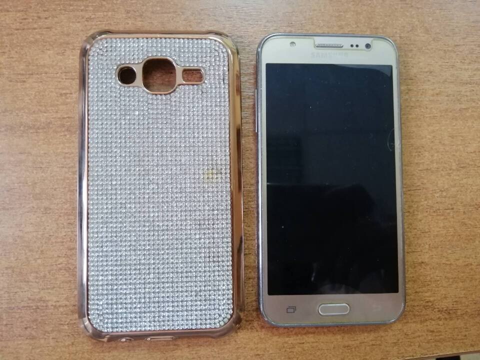 Мобільний телефон «Samsung J5», золотистого кольору з чохлом та сім-картою «Vodafon», IMEI 357950070959361/01, 35800007095936/01